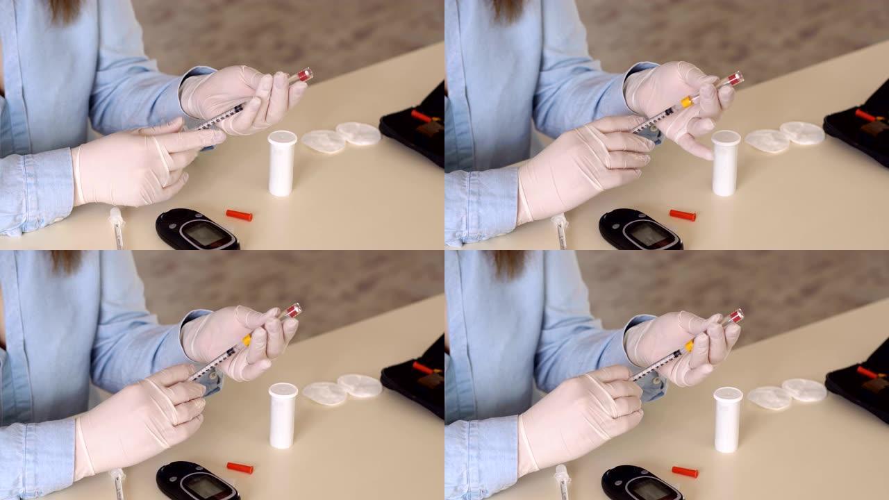 一个女人在胰岛素注射器中提取胰岛素的特写镜头。
