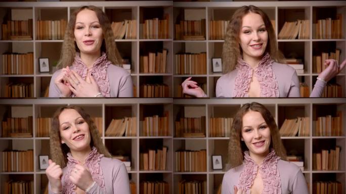 高加索波浪形金发图书管理员的肖像在书架背景上热情地对着镜头说话。