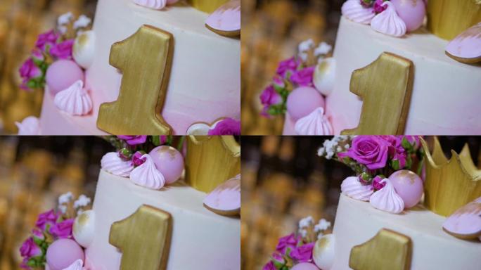 第一个生日庆祝蛋糕，带有第一和鲜花。