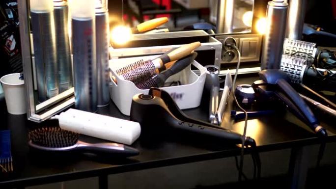 化妆师桌，配有4k慢动作60fps的护发产品和工具
