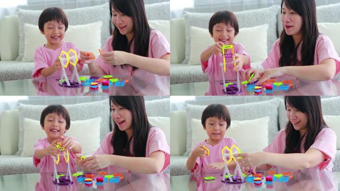 母子在家里玩磁铁