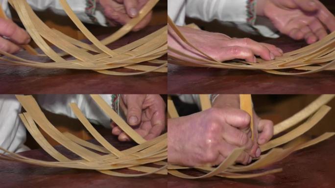 用自己的双手用松木贴面编织篮子。用松木瓦编织的古老篮子