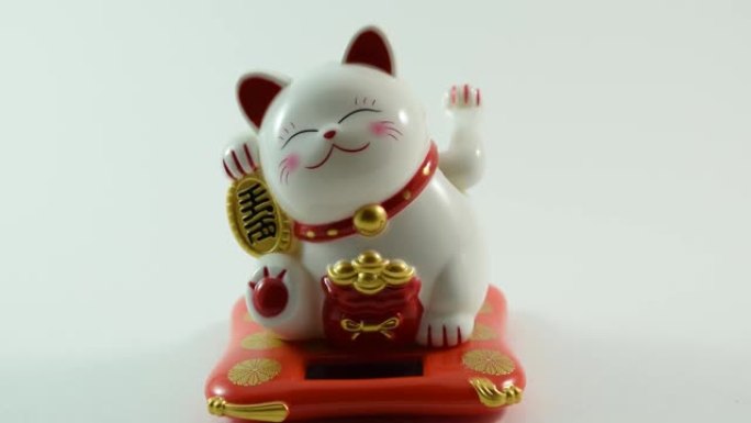 受欢迎的猫角色Maneki Neko挥舞着爪子，吸引买家。视频订阅