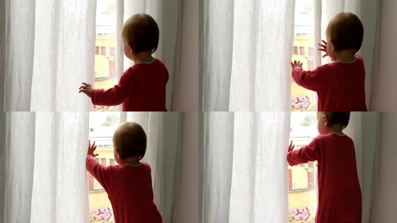 婴儿向窗外看