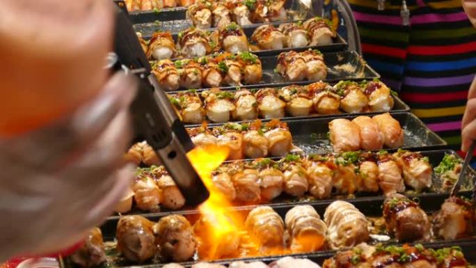 日本餐厅厨师烧烤鲑鱼寿司