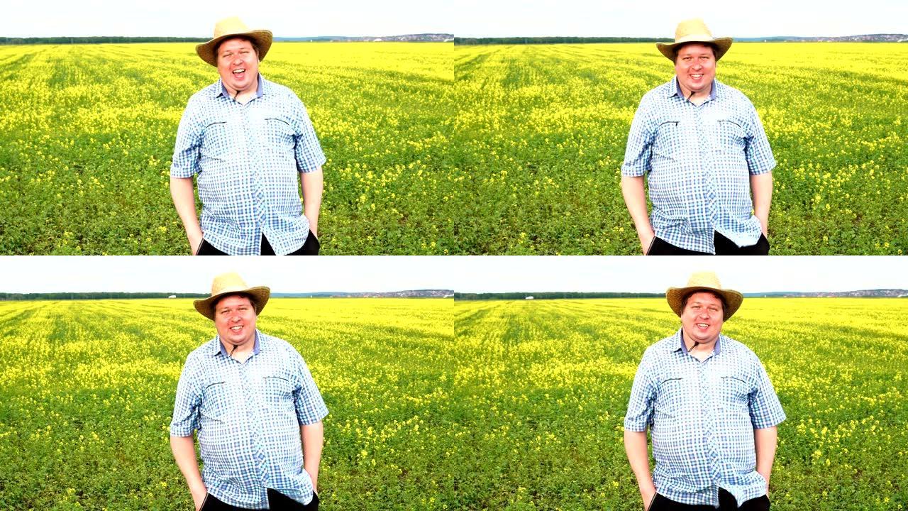 晴天站在田间的胖农夫肖像