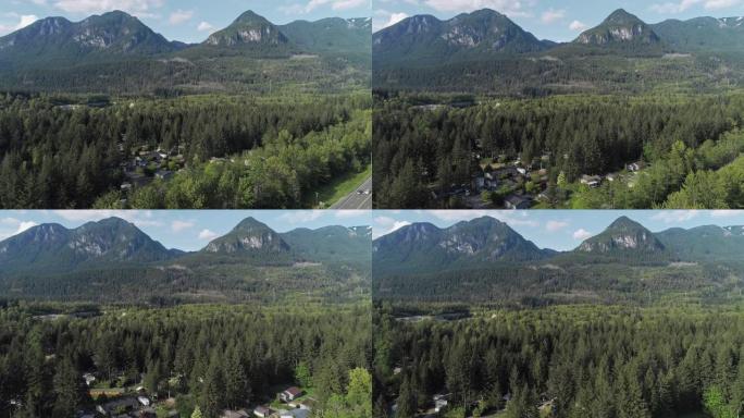 美国西北部华盛顿州山区小镇金条的鸟瞰图。无人机视频具有加速的前进摄像机运动。
