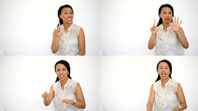 白色背景上美丽的年轻非洲裔美国妇女对相机股票视频说话和微笑
