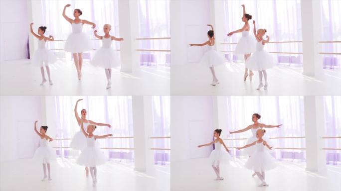 芭蕾舞老师带着孩子穿着芭蕾舞短裙，在课堂上tip着脚尖跳舞。
