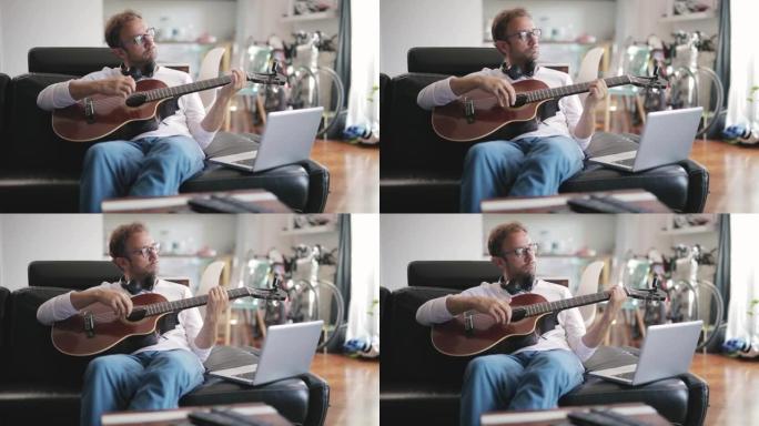 男人在客厅弹吉他。