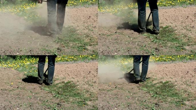 工人使用细绳草坪修剪器在土壤之间割草