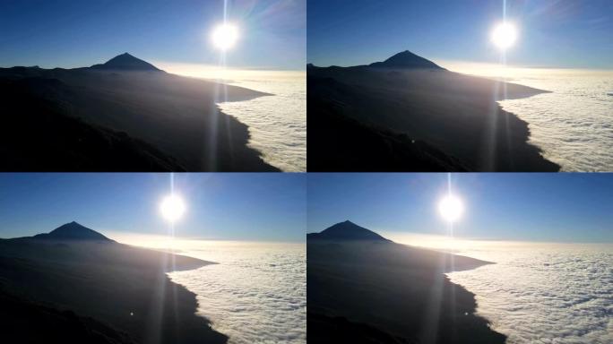 云层的空中全景覆盖了西班牙加那利群岛特内里费岛的拉克鲁斯港和泰德国家公园。