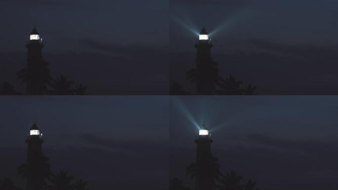 夜间带光束的灯塔
