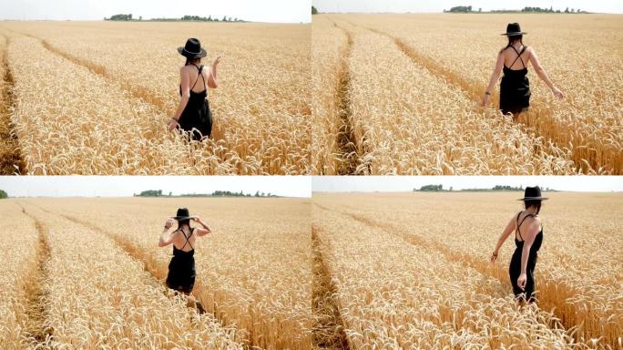 穿着黑色连衣裙和帽子的女人在球场上