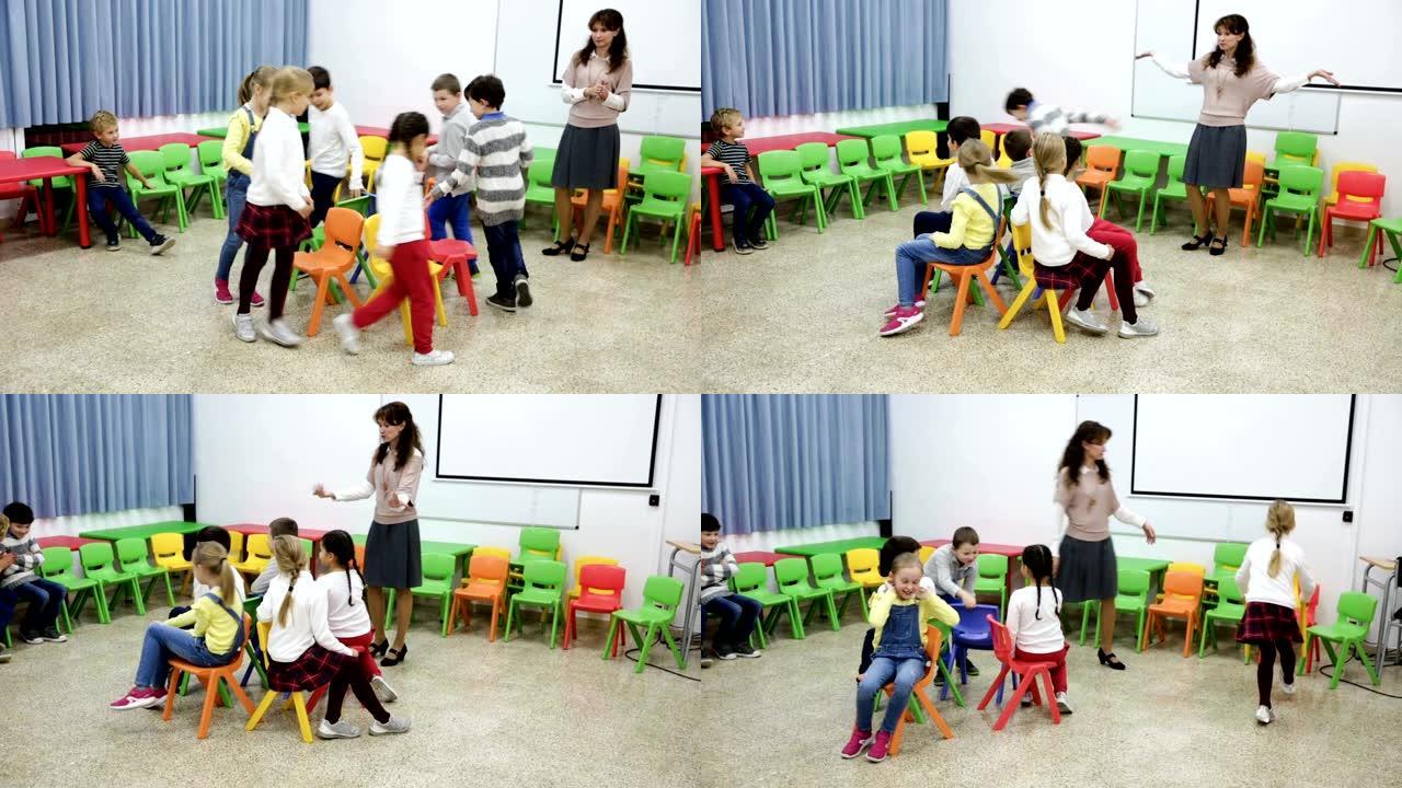 一群开朗的学童和老师一起玩活跃的游戏