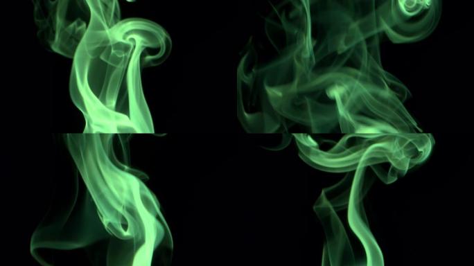 细细的鲜绿色烟雾慢慢滚滚而来。彩色烟雾吹到顶部。特写，孤立在黑色背景上。