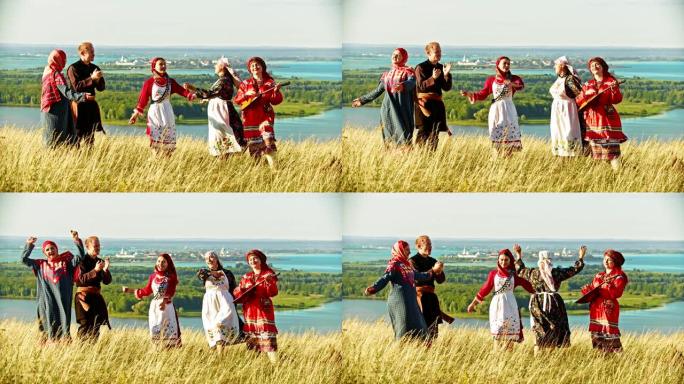 穿着传统俄罗斯服装的年轻合奏在音乐中跳舞