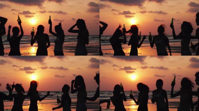 在日落背景下的海滩夏天，亚洲青少年团体一起跳舞和喝饮料的剪影。青年亚洲快乐情感和周年庆典。4k分辨率