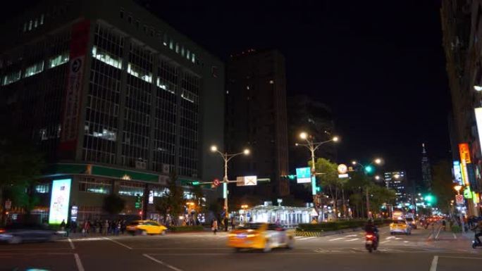 夜光照亮台北市交通街道十字路口全景4k台湾