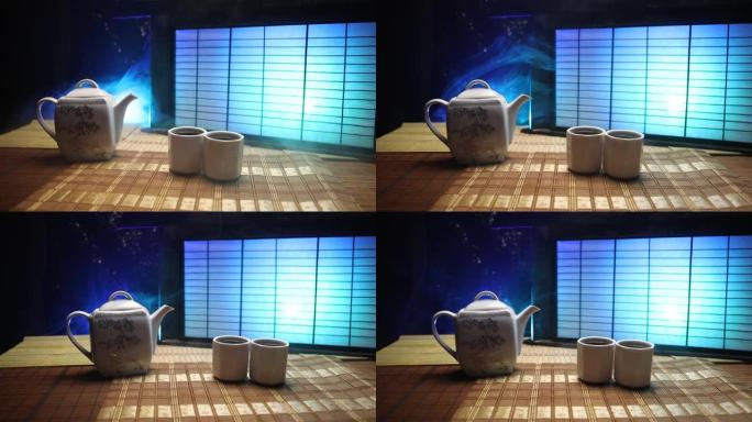 茶概念。日本茶道文化东方饮料。茶壶和茶杯放在桌子上，配有竹子和传统日本装饰元素