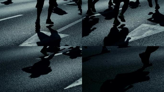 城市马拉松。人们的双腿特写