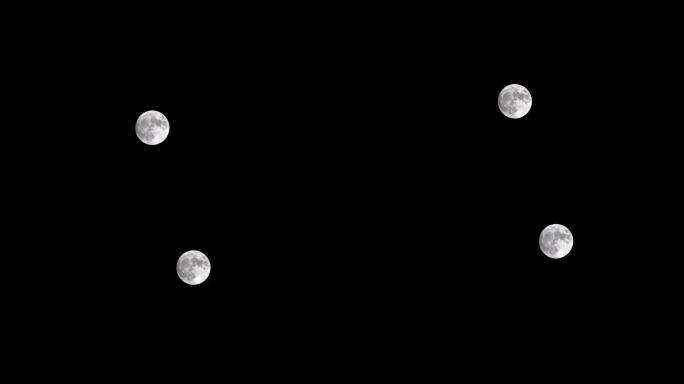 满月在夜空中移动，没有云。4k镜头，时间流逝。神秘的月亮从下到上移动。月光照在黑色的夜空中。