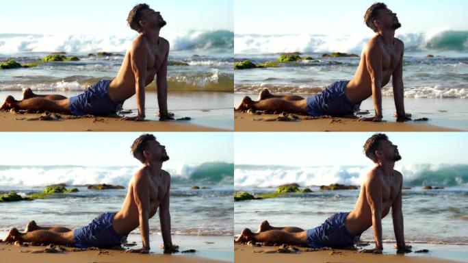 帅哥在沙滩上冥想瑜伽姿势