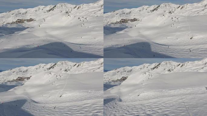 山里滑雪的人的鸟瞰图