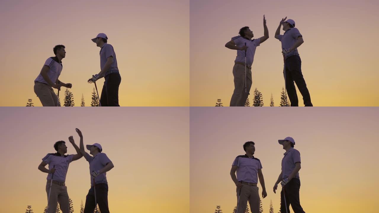 友谊高尔夫球队跳伞在高尔夫球场的绿色日落景观俱乐部有一个不错的成绩，暑假体育放松，电影慢动作镜头