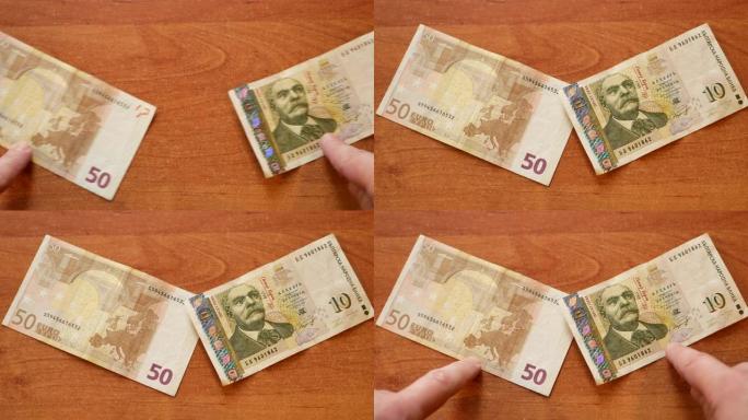 欧元钞票在桌上与保加利亚列弗会面
