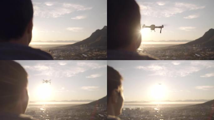 一架无人机在城市上空飞行并进入日落的特写镜头-电影的万向节镜头