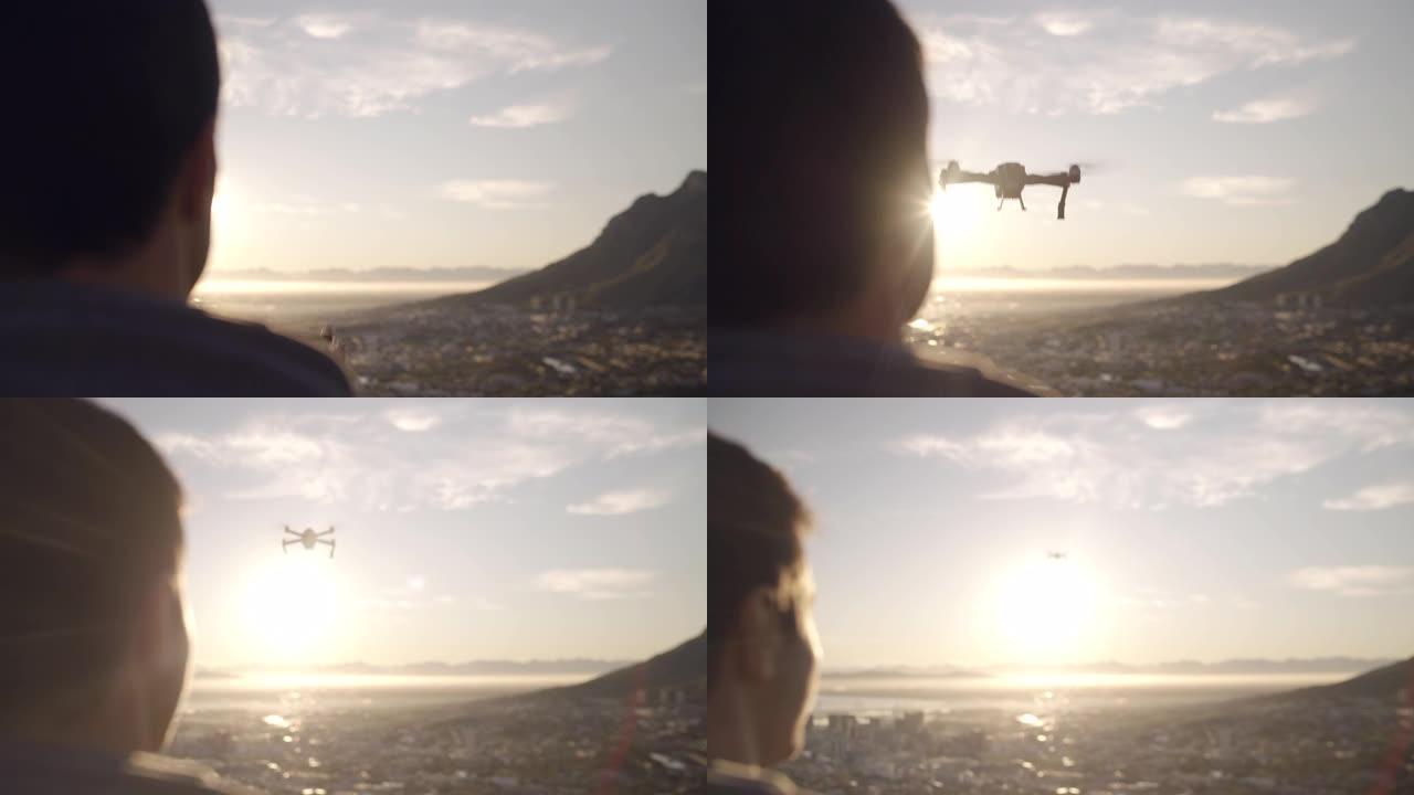 一架无人机在城市上空飞行并进入日落的特写镜头-电影的万向节镜头