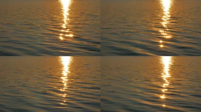 夏季舒缓的水波表面的太阳反射和眩光