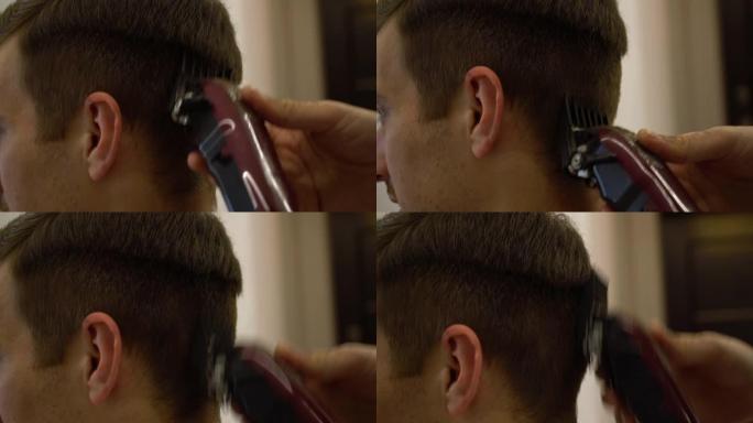 理发师用理发刀剪了一个男人