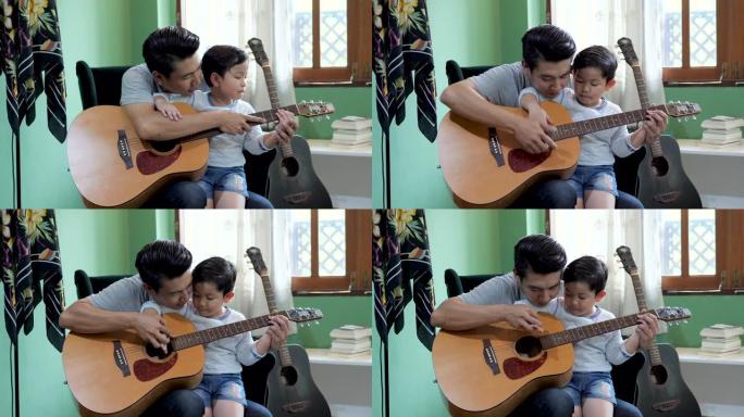 他的儿子弹吉他