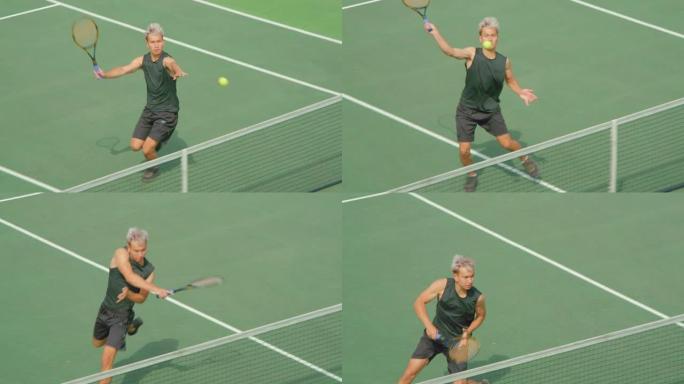 一名网球运动员沿着网跑着抽射。