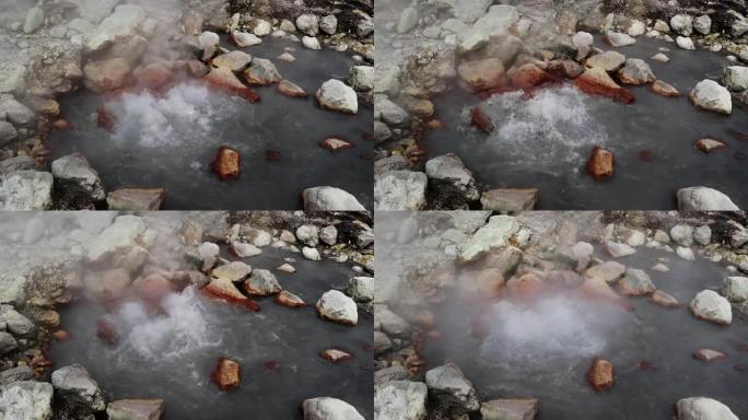 在亚速尔群岛圣米格尔岛的石头之间的温泉中沸腾的水