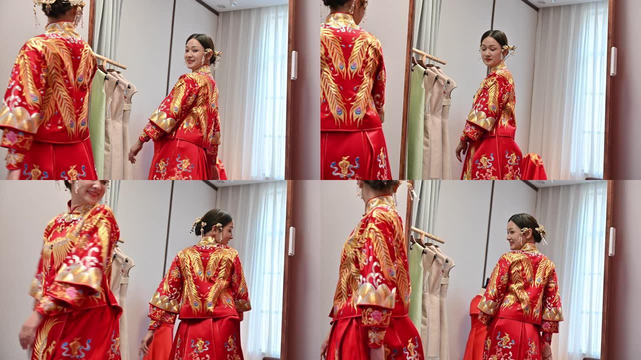 年轻的中国新娘看着镜子里的倒影