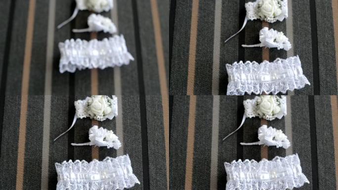 美丽的新娘吊袜带和鲜花