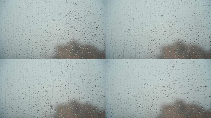 下雨天玻璃窗上的水珠空镜头 4K