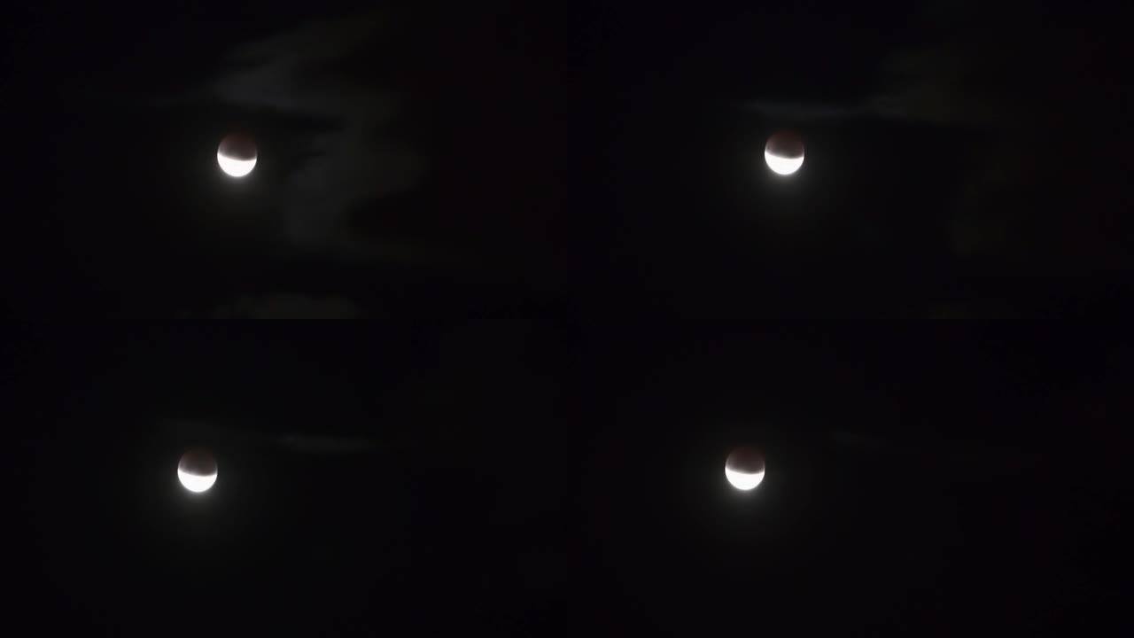 月偏食期间月亮在夜空上移动