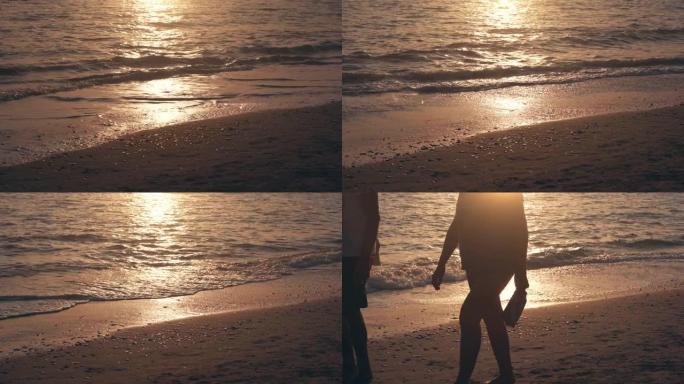 意大利奥斯蒂亚海滩上美丽的日落。夕阳下的海浪和沙子