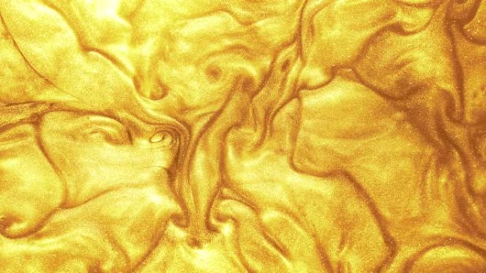 流体运动覆盖金色闪光油漆纹理
