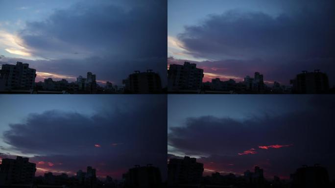 晚上五颜六色的性感天气，浪漫的云时间流逝。晴天云变色，橙色，粉色云，蓝色雨云，红色紫色橙色蓝色粉色日