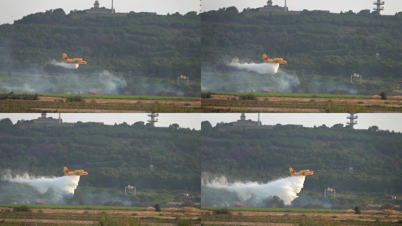 飞机庞巴迪将水倾倒在火上