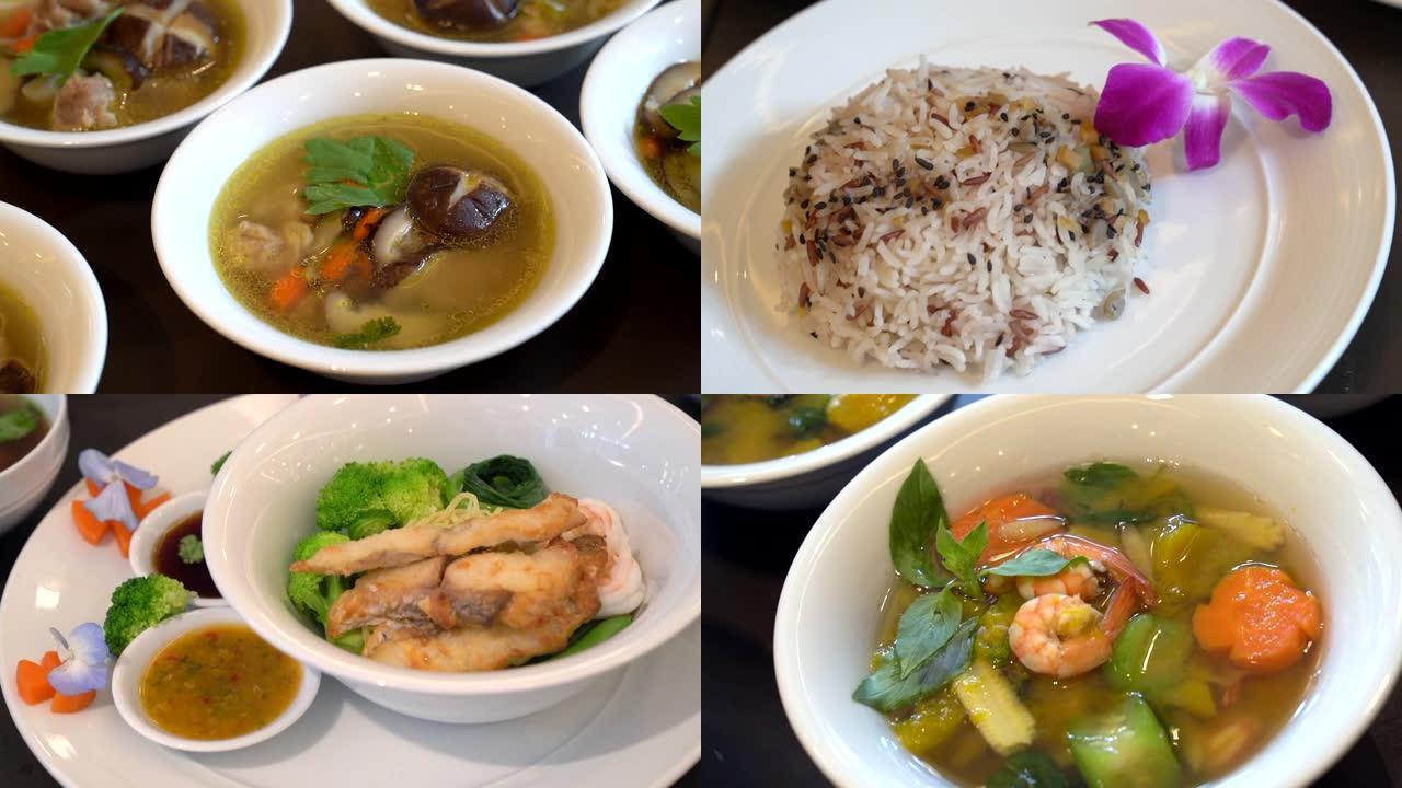 健康应用现代和传统泰国食品金枪鱼沙拉，鸡肉药草汤，糙米，鲑鱼面条，虾配黄汤，蔬菜卷奇肯。