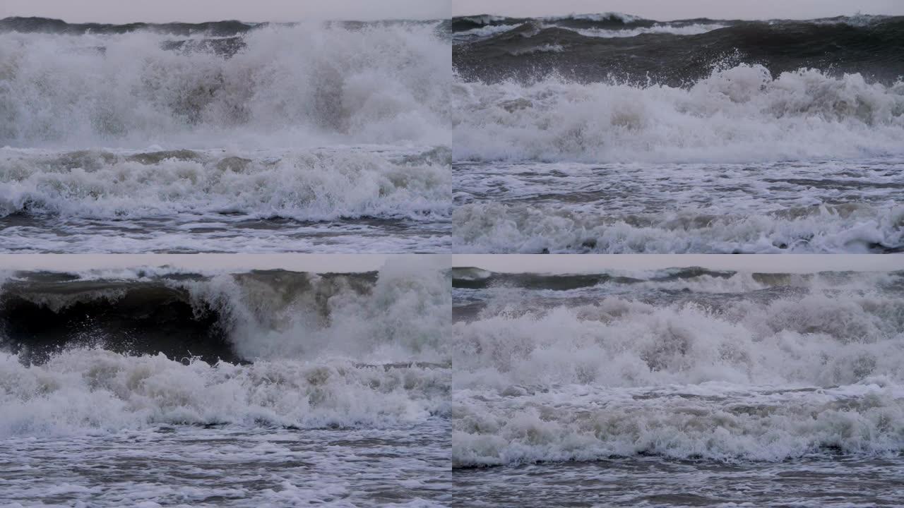 极大的海浪撞击海岸，太平洋美丽的海浪。超级慢动作。风暴期间的海浪。强大的海上热带飓风。全球变暖。恶劣