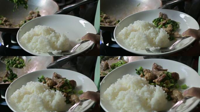 泰国菜、米饭和炒猪肉
