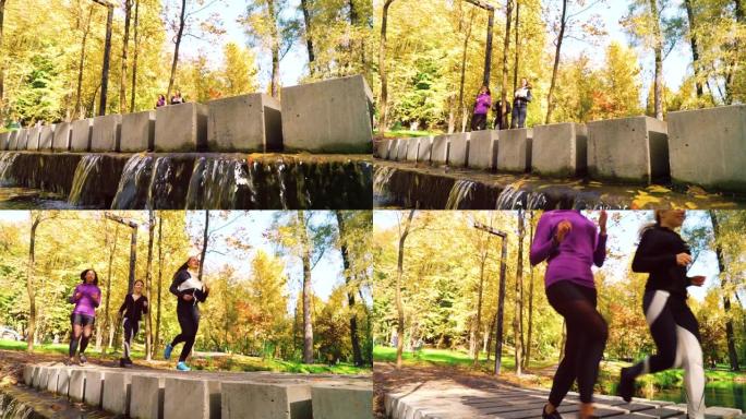 在公园的现代桥上奔跑的运动女孩