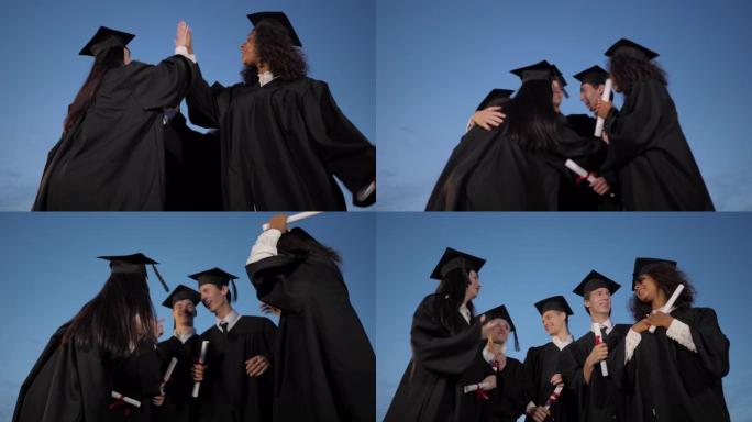 毕业典礼后快乐毕业班学生多族群拥抱做高五